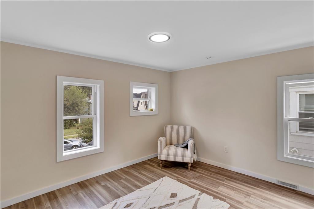 1430 Ridge Avenue Coraopolis, PA 15108 - Photo 25 of 32 a living room with furniture and a window