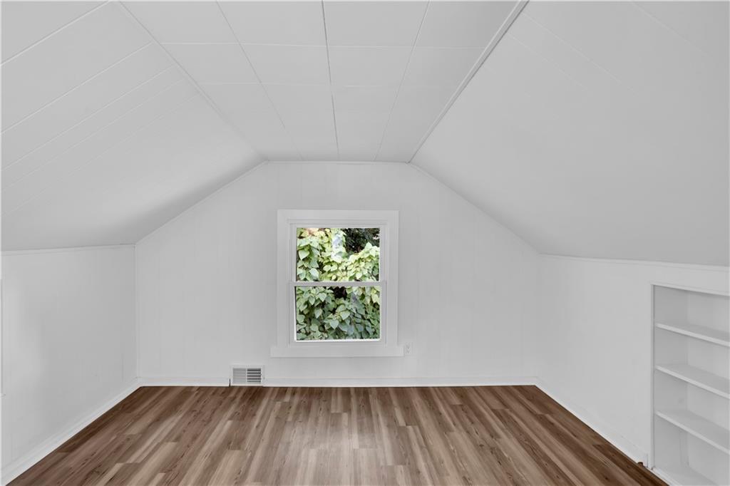 1430 Ridge Avenue Coraopolis, PA 15108 - Photo 27 of 32 a view of room with hardwood floor and window