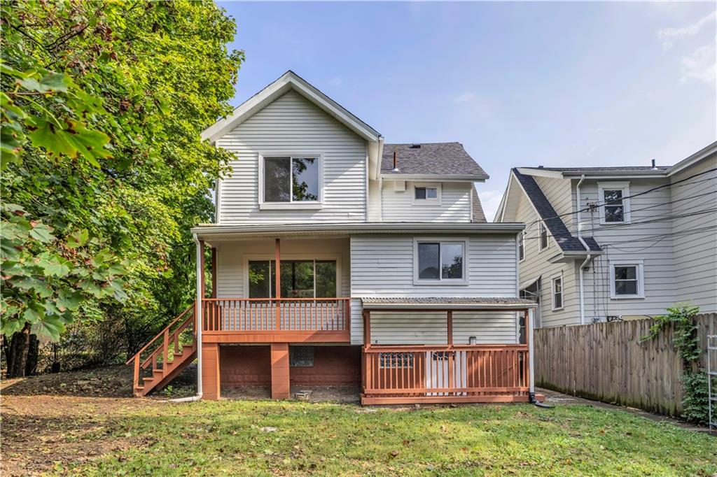 1430 Ridge Avenue Coraopolis, PA 15108 - Photo 3 of 32 a view of a house with a yard and plants
