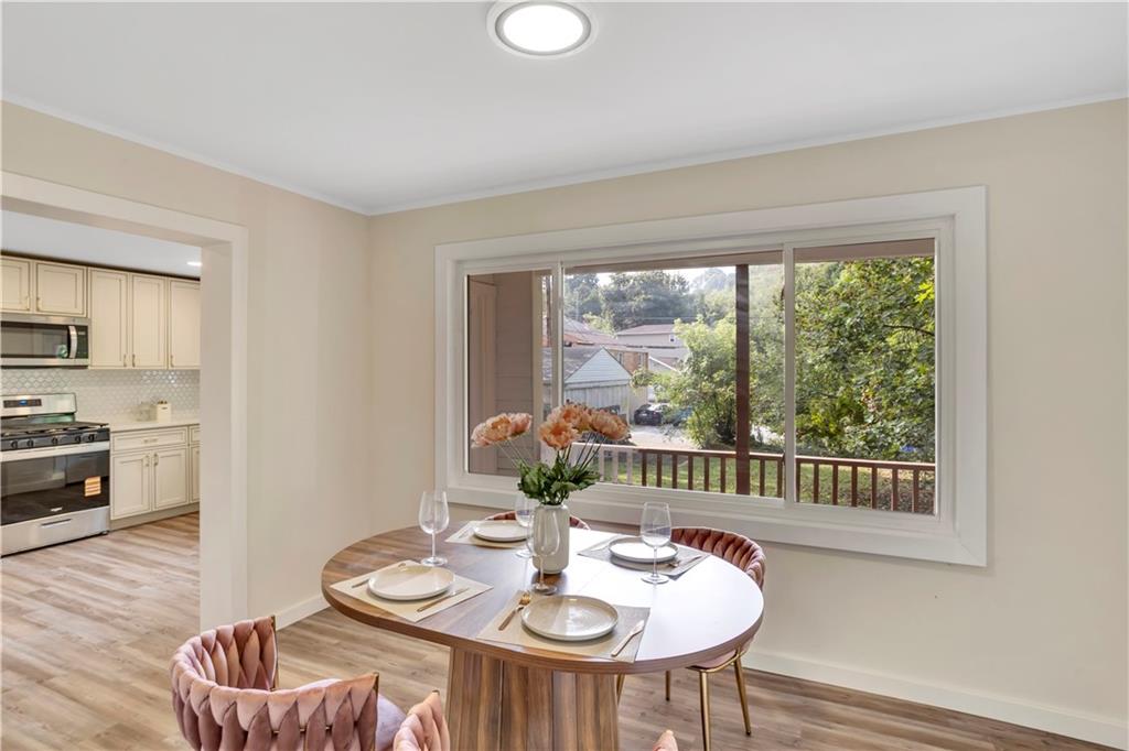 1430 Ridge Avenue Coraopolis, PA 15108 - Photo 10 of 32 a living room with furniture and a table