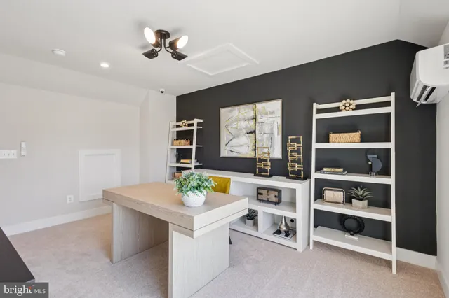 a living room with furniture and decor