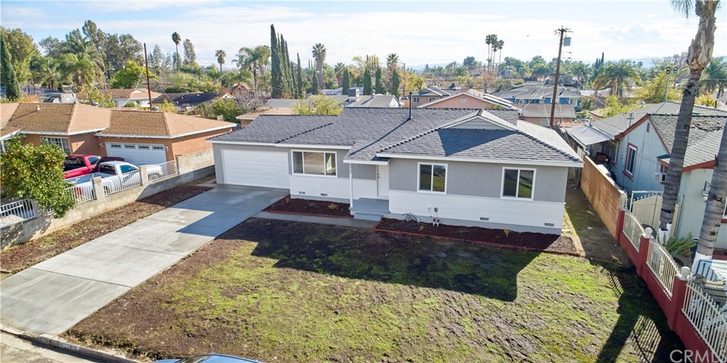 10550 Cook Avenue Riverside, CA 92505 - Photo 1 of 1 a front view of a house with a yard