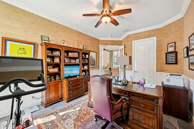 a work room with furniture and window