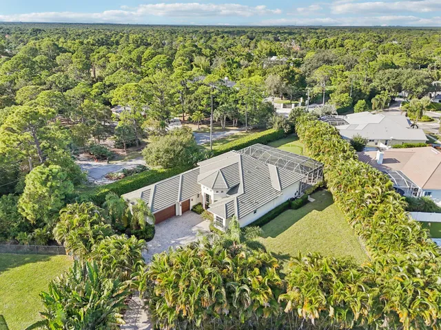 a view of a yard with a swimming pool