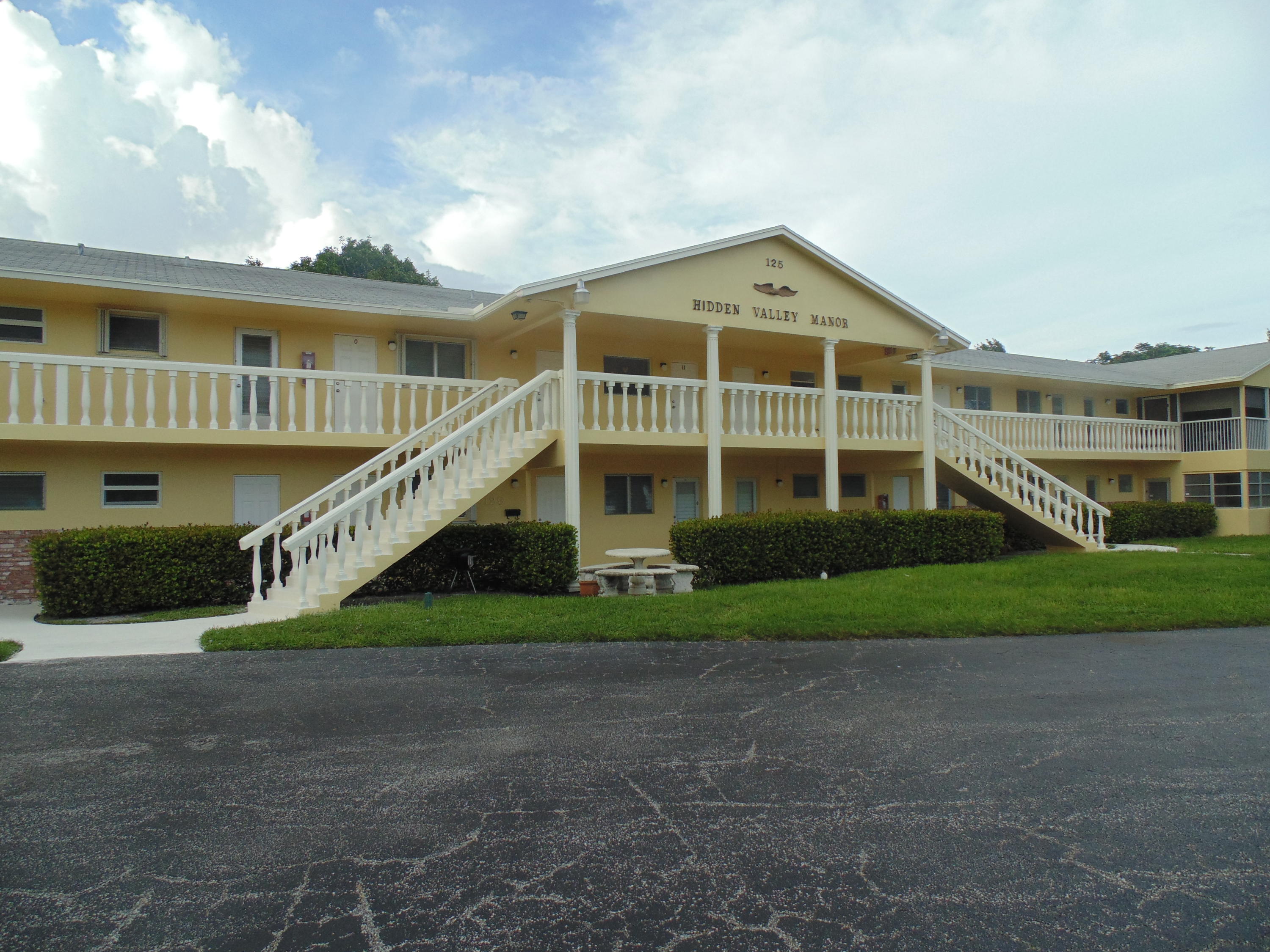 125 West Hidden Valley Boulevard, Unit 11 Boca Raton, FL 33487 - Photo 1 of 12 Front