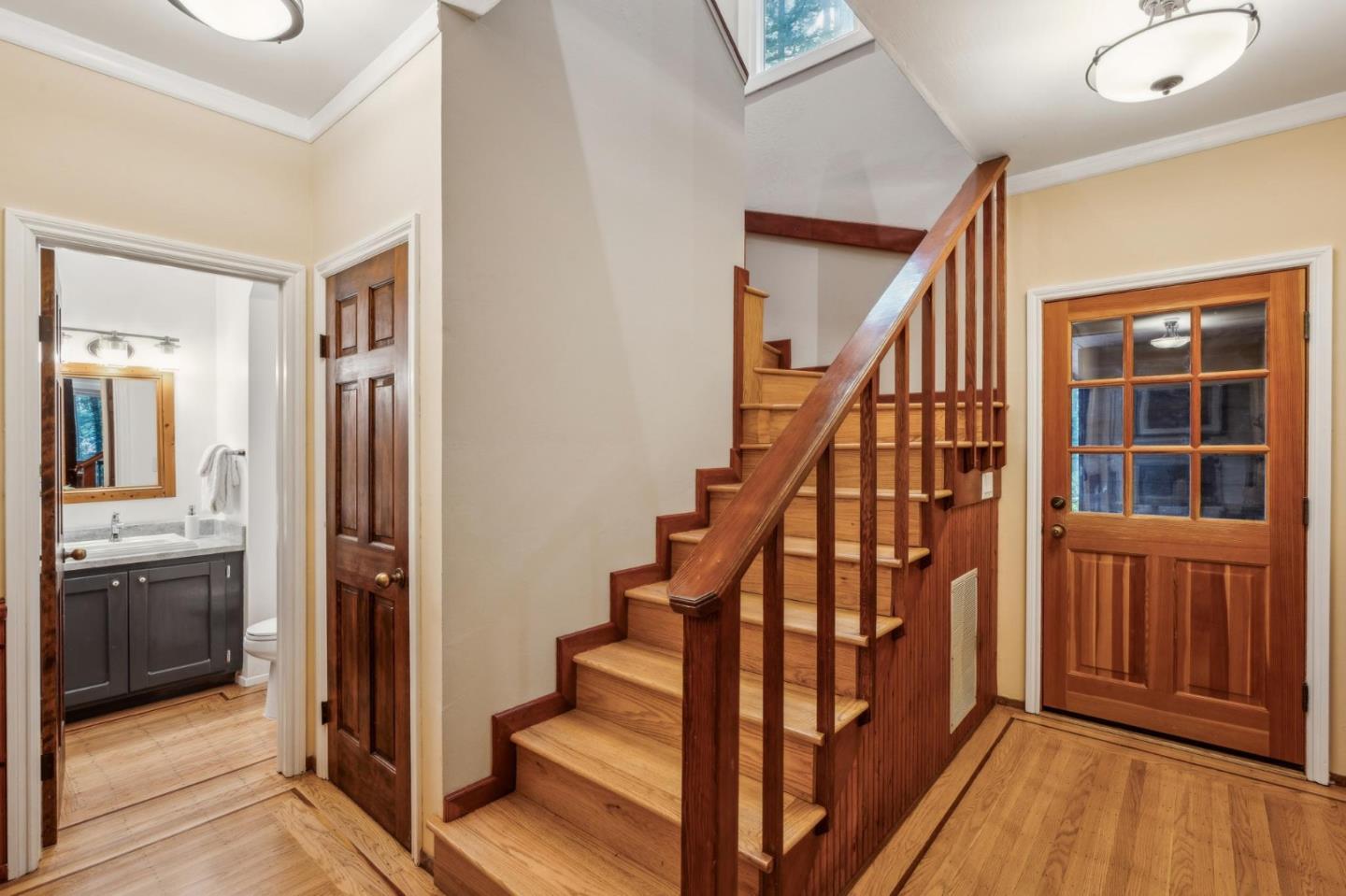 13872 Silver Sky Way Woodside, CA 94062 - Photo 34 of 78 a view of an entryway with wooden floor and staircase