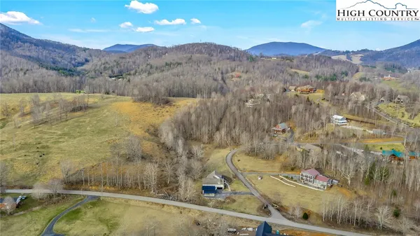 a view of a swimming pool with a mountain view