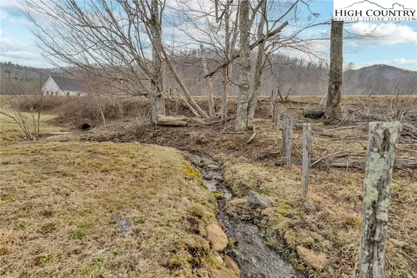 a view of a backyard of the house