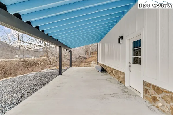 a view of a porch with seating space