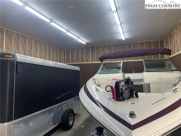 a utility room with two washing machine