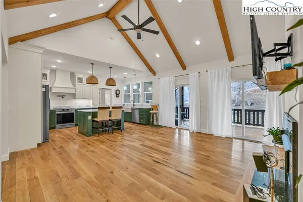 a view of a living room and dining room