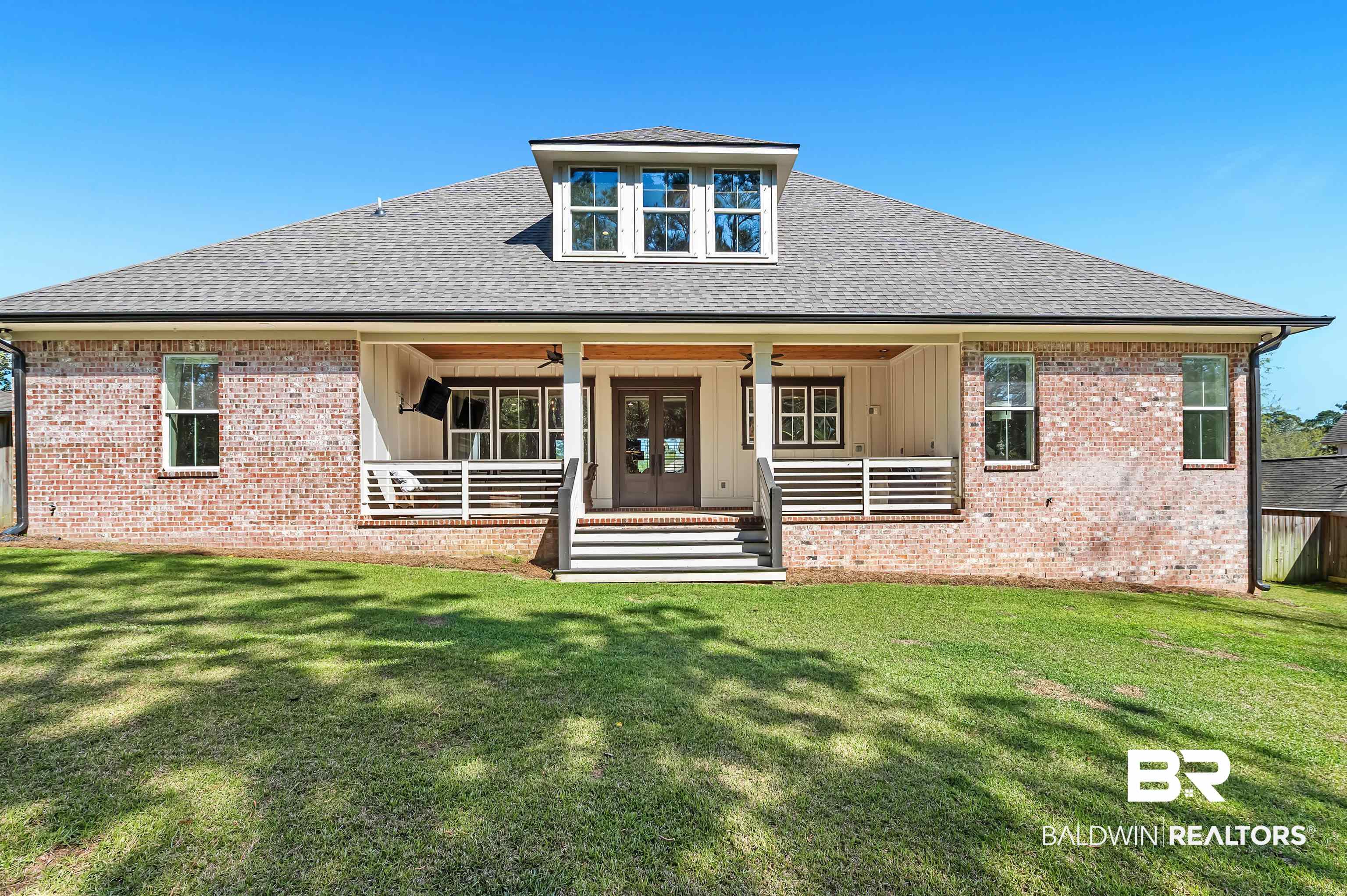 27888 Oakachoy Loop Daphne, AL 36526 - Photo 52 of 65 View of front of property with a ceiling fan, french doors, and a front yard