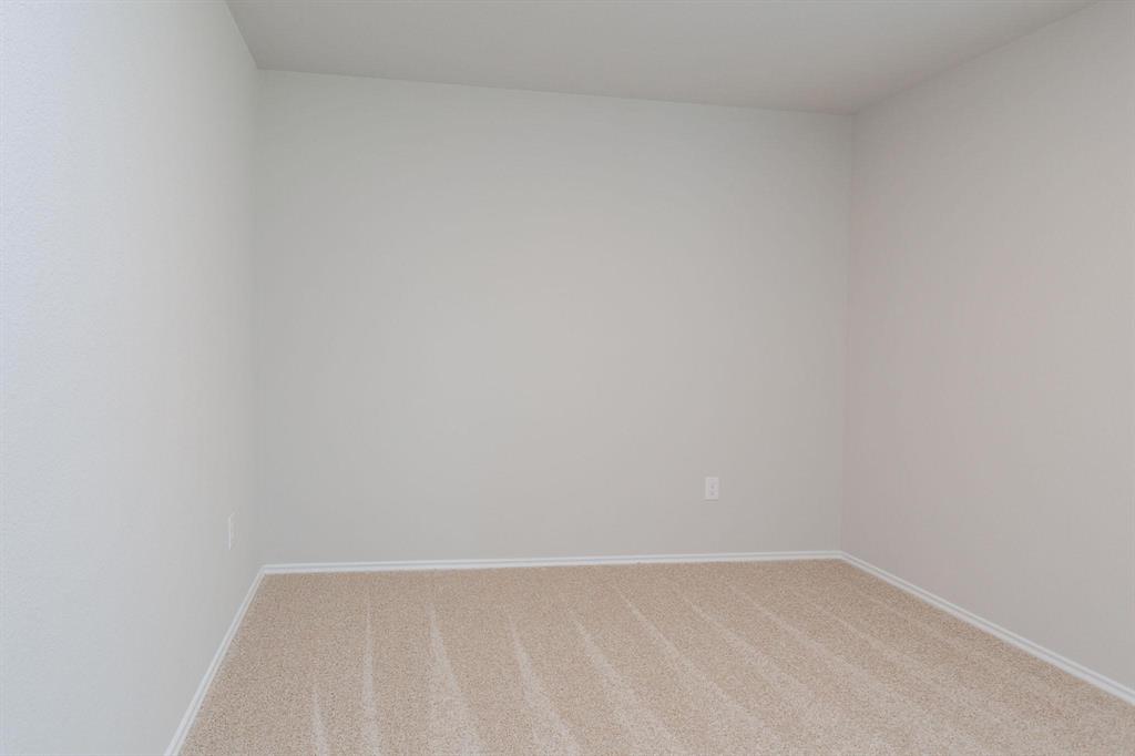 6009 Ronee Leah Drive Austin, TX 78724 - Photo 14 of 16 A well-proportioned room with plush carpeting offers a neutral canvas for personalization.