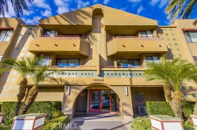 a front view of a building with a street