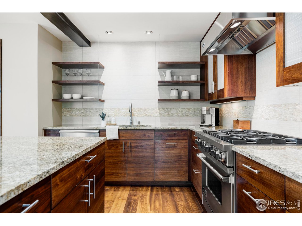 3750 Spring Valley Road Boulder, CO 80304 - Photo 13 of 39 a kitchen with a sink a stove and cabinets