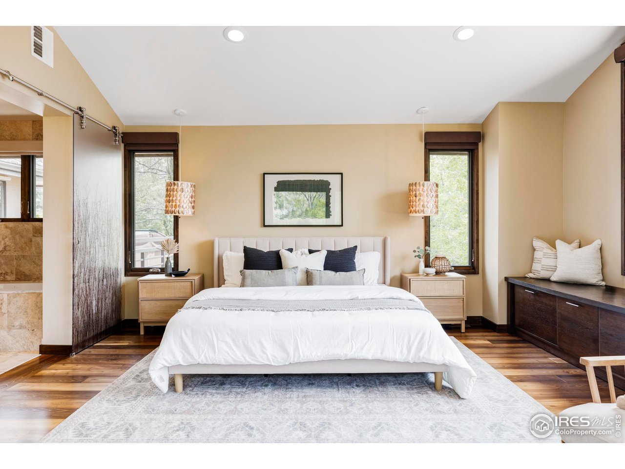 3750 Spring Valley Road Boulder, CO 80304 - Photo 18 of 39 a bedroom with a bed a couch and dresser