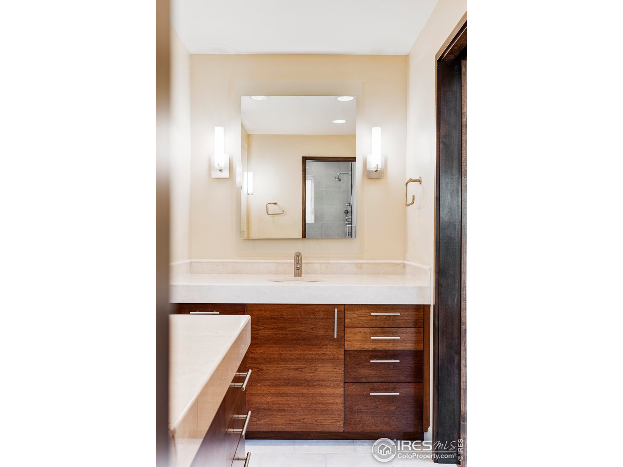 3750 Spring Valley Road Boulder, CO 80304 - Photo 26 of 39 a bathroom with a sink and a mirror