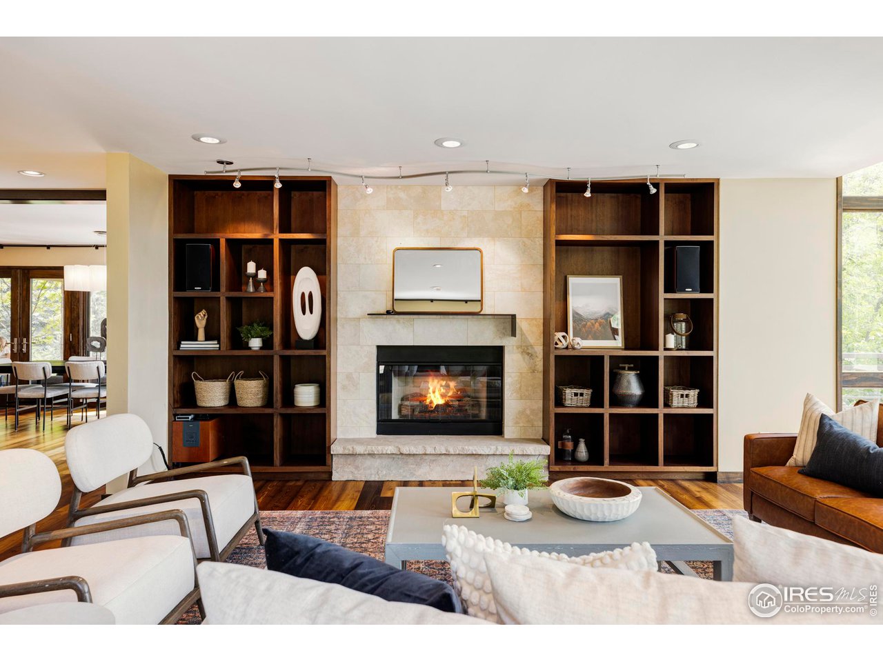 3750 Spring Valley Road Boulder, CO 80304 - Photo 5 of 39 a living room with furniture and a fireplace