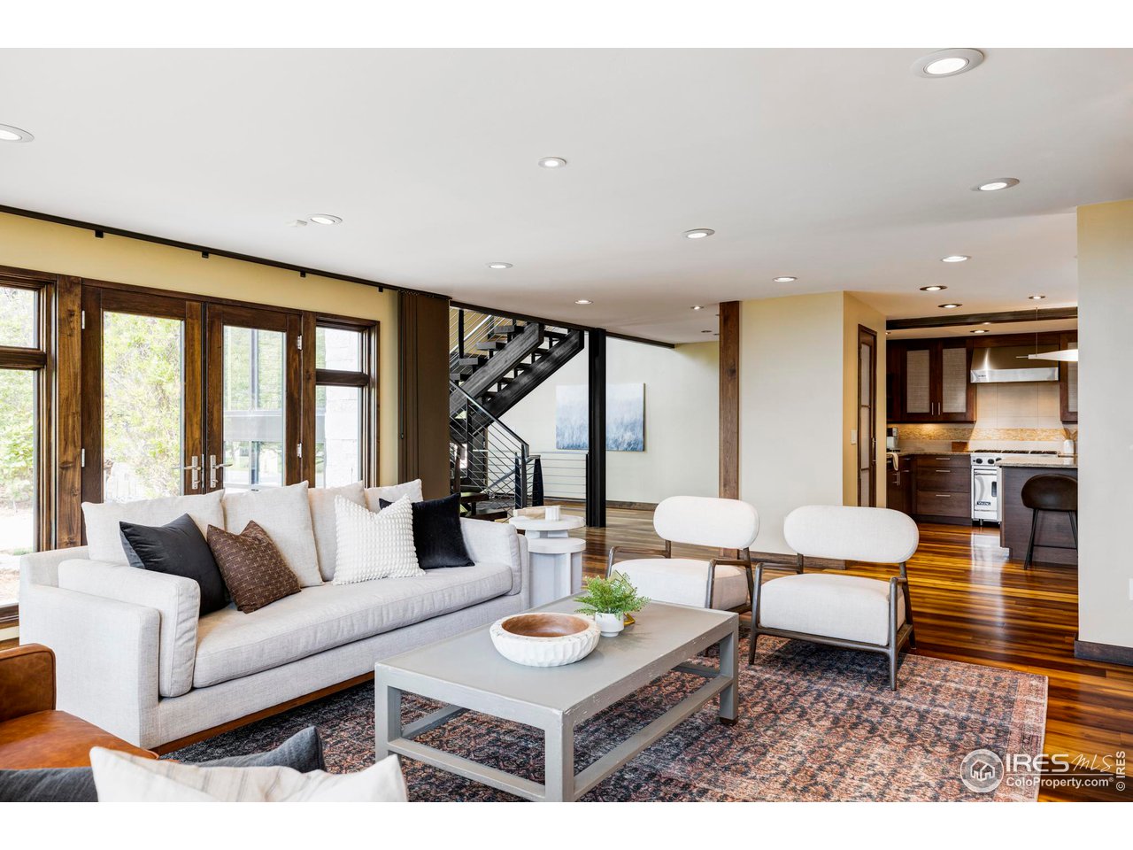 3750 Spring Valley Road Boulder, CO 80304 - Photo 6 of 39 a living room with furniture and a large window