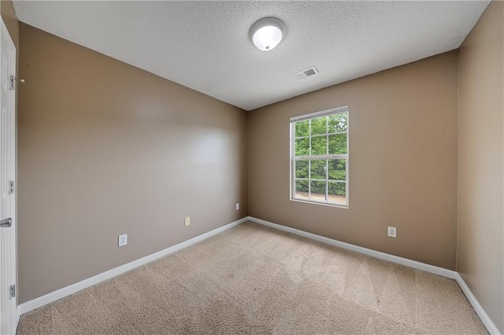 4203 Legacy Square Atlanta, GA 30349 - Photo 31 of 35 an empty room with a window