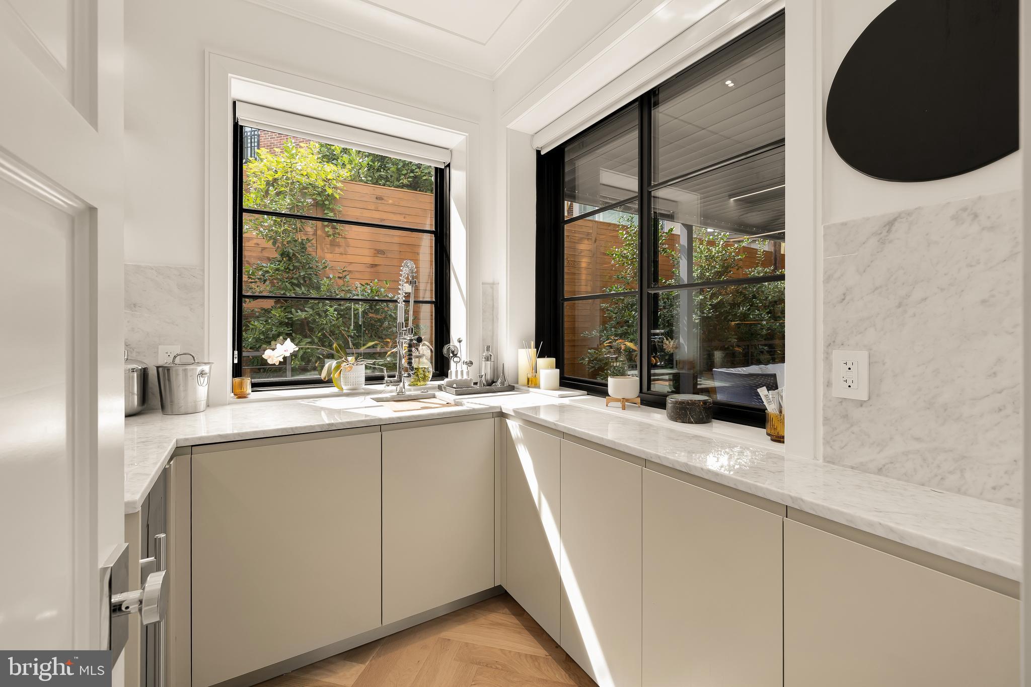 3302 Cleveland Avenue Northwest Washington, DC 20008 - Photo 13 of 54 Butlers pantry with service window to patio