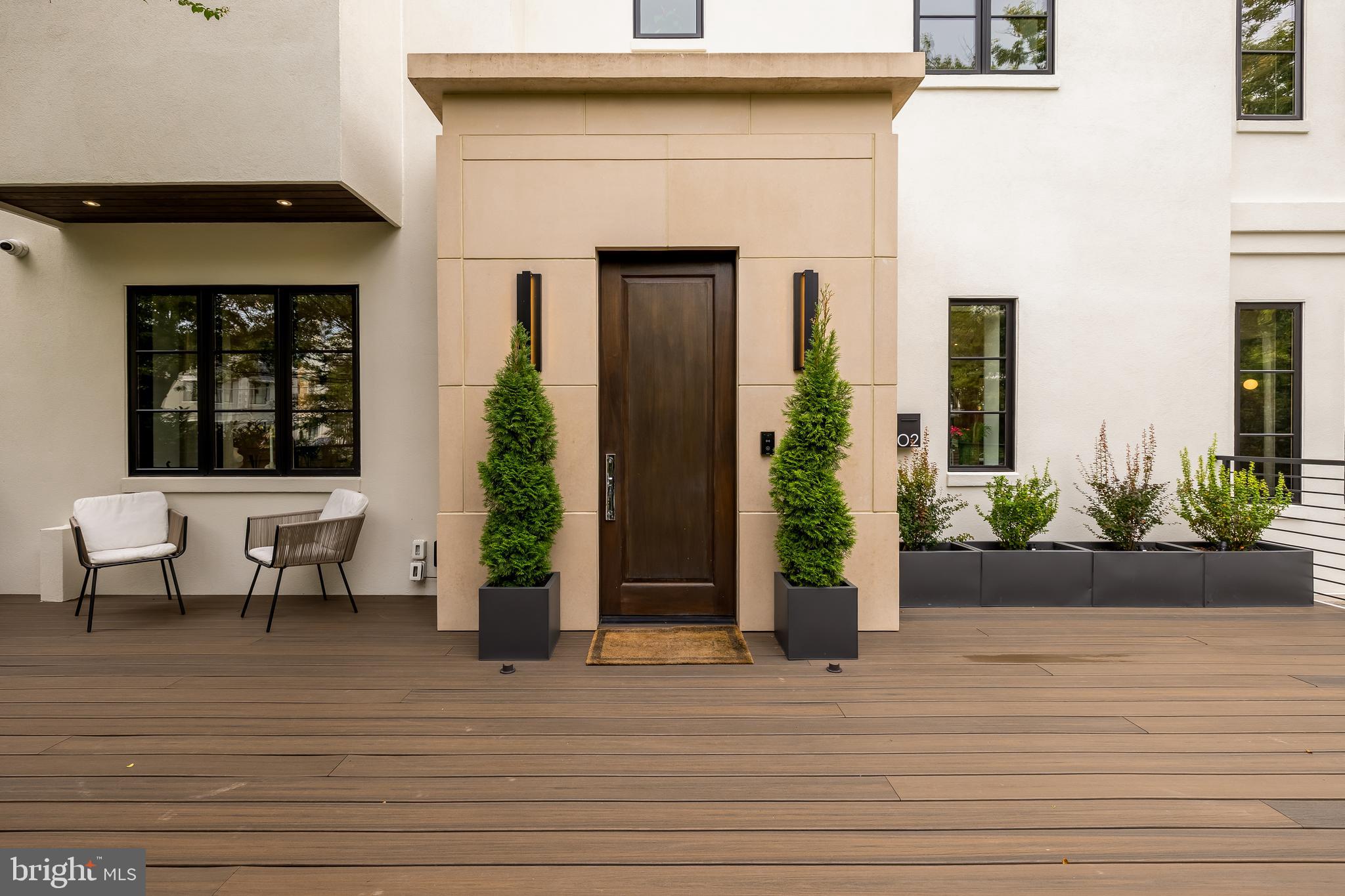 3302 Cleveland Avenue Northwest Washington, DC 20008 - Photo 2 of 54 Limestone archway with African Mahogany door