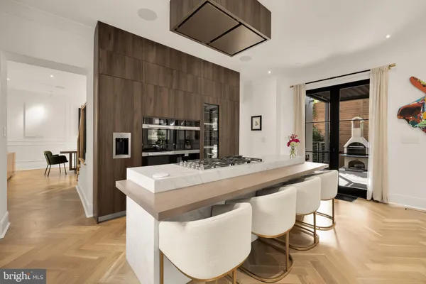 a outdoor living space with patio furniture and a potted plant