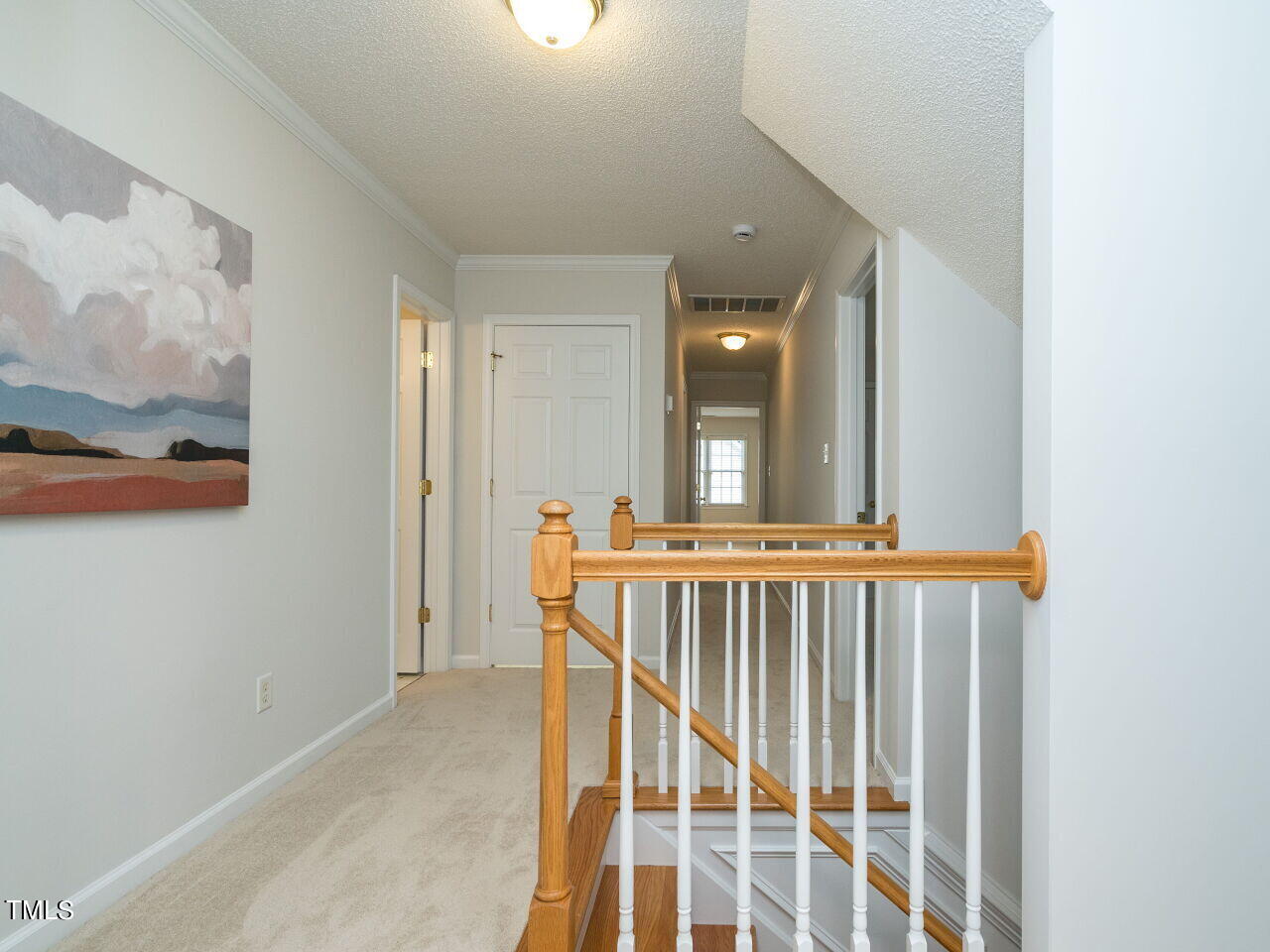 760 Hadrian Drive Garner, NC 27529 - Photo 18 of 38 a view of a bedroom with wooden floor
