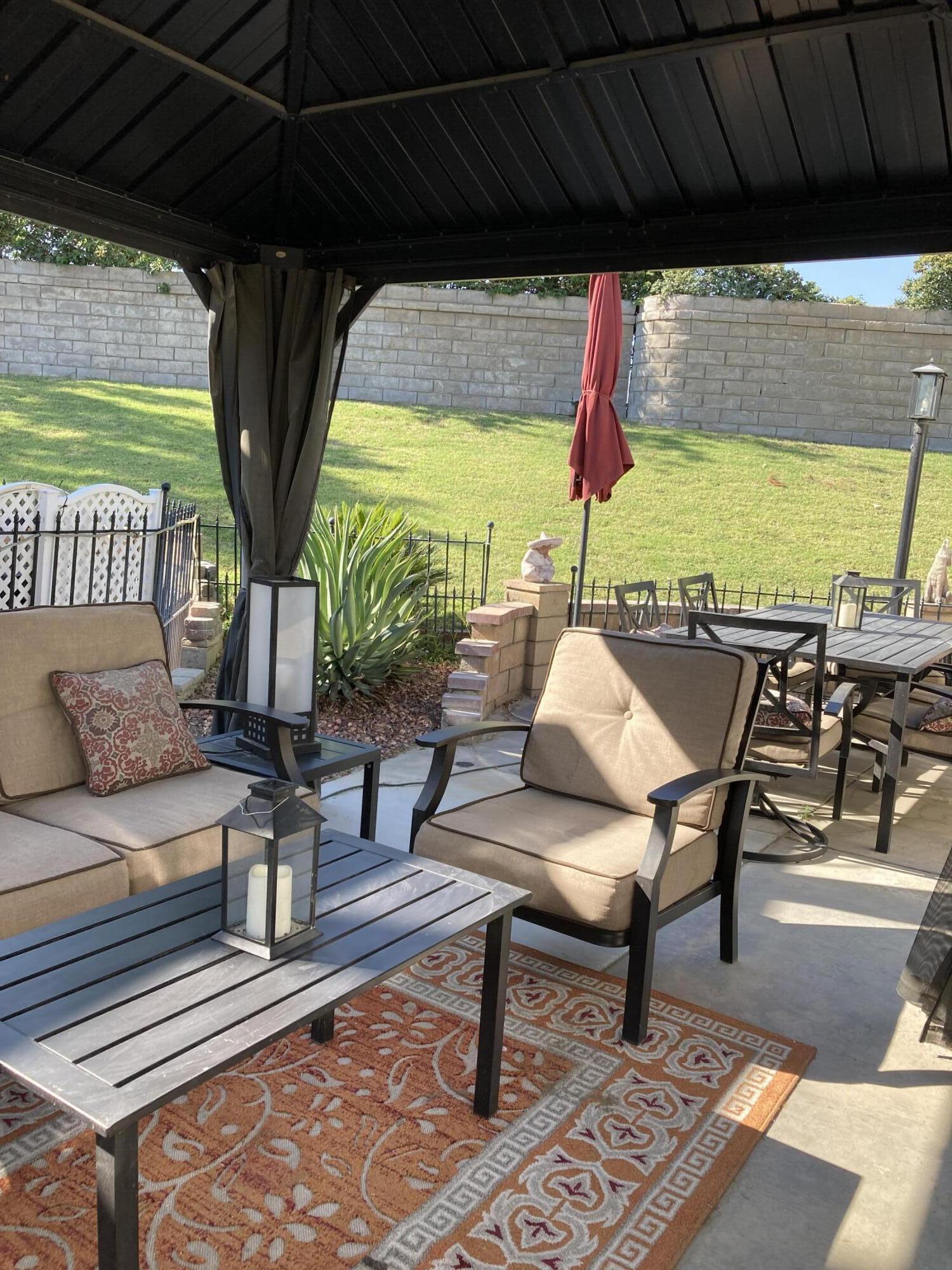 69411 Ramon Road, Unit 21 Cathedral City, CA 92234 - Photo 1 of 9 a outdoor view with a sitting space