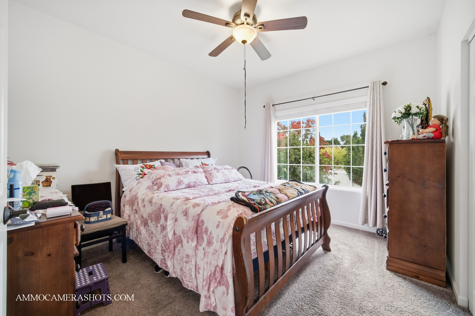 1417 Manning Avenue Montgomery, IL 60538 - Photo 14 of 26 a bedroom with a bed and a chandelier