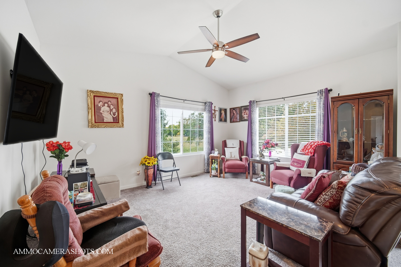 1417 Manning Avenue Montgomery, IL 60538 - Photo 6 of 26 a living room with furniture and a flat screen tv