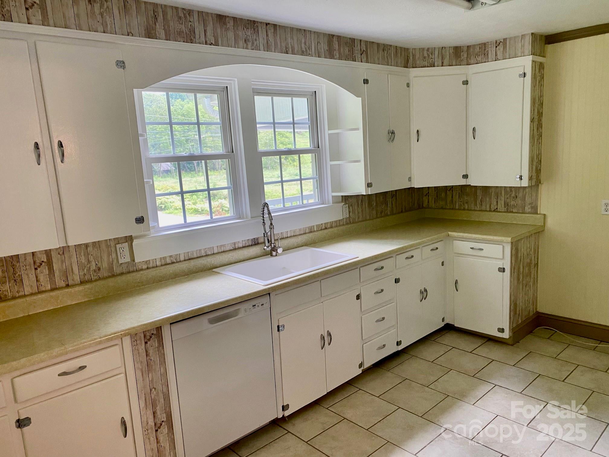 1294 Cane Creek Road Bakersville, NC 28705 - Photo 12 of 43 a view of a kitchen with cabinets