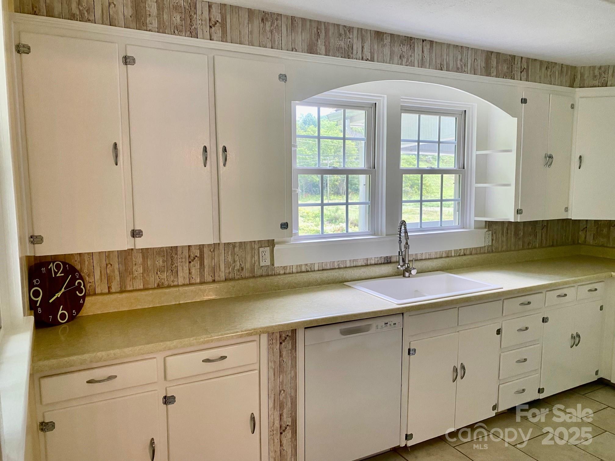 1294 Cane Creek Road Bakersville, NC 28705 - Photo 14 of 43 a kitchen with a sink and cabinets