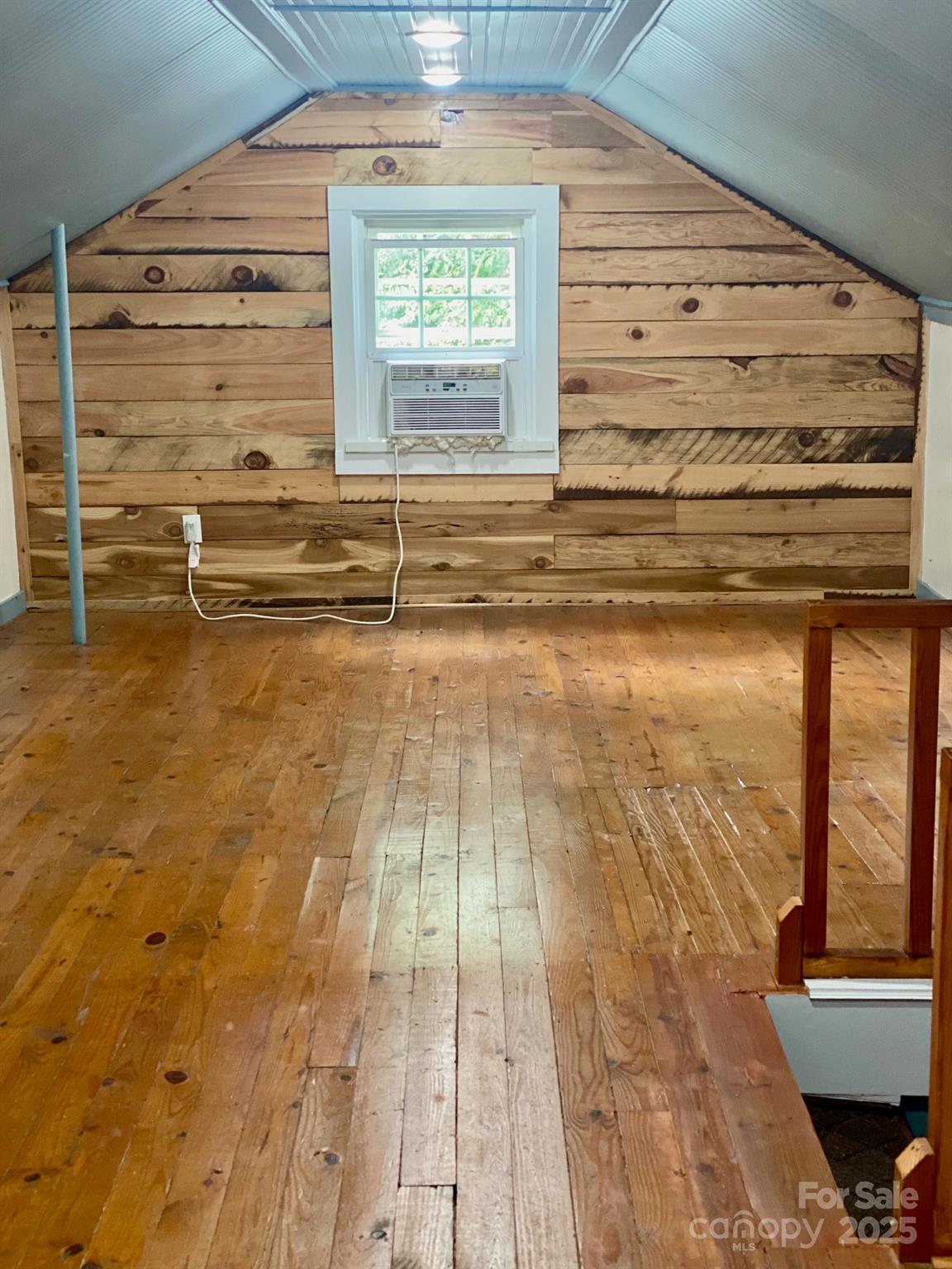 1294 Cane Creek Road Bakersville, NC 28705 - Photo 27 of 43 a view of empty room with wooden floor