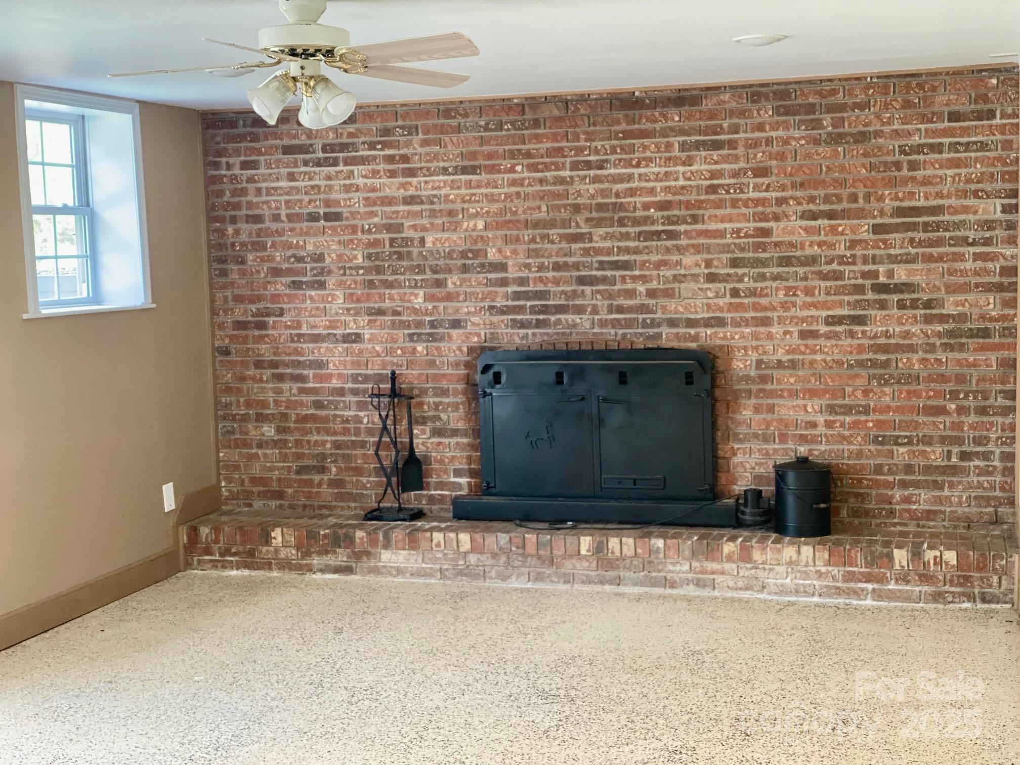 1294 Cane Creek Road Bakersville, NC 28705 - Photo 34 of 43 a living room with a fireplace