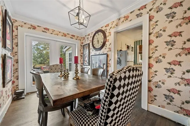 a view of a kitchen with cabinet and mirror