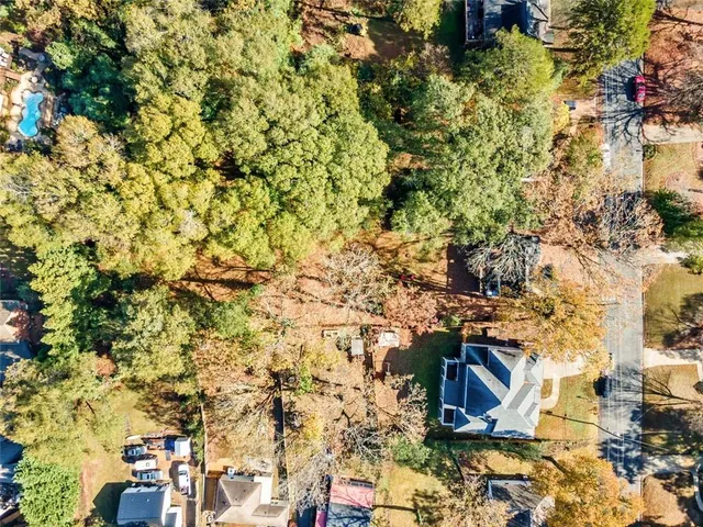 a view of a garden from a balcony