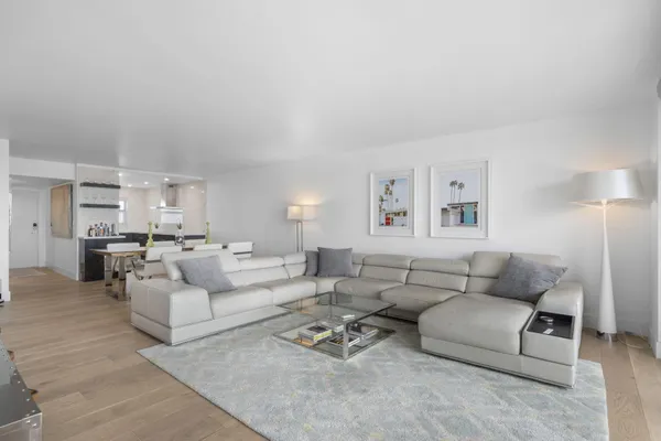 a living room with furniture and a couch