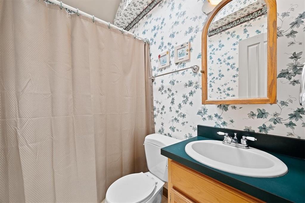450 Vaneal Road Washington, PA 15301 - Photo 12 of 25 a bathroom with a sink and a mirror