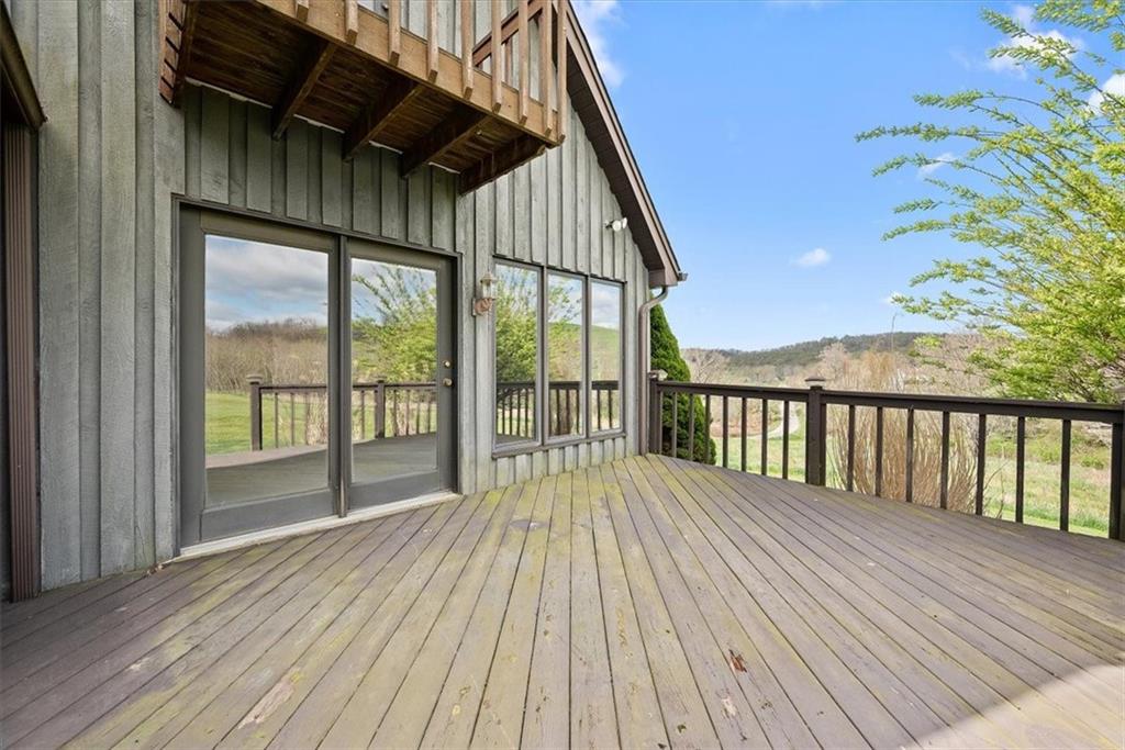 450 Vaneal Road Washington, PA 15301 - Photo 20 of 25 a view of backyard with a deck and wooden floor