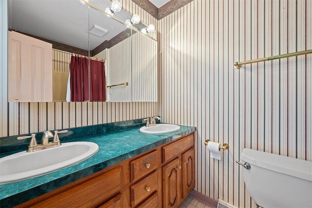 450 Vaneal Road Washington, PA 15301 - Photo 6 of 25 a bathroom with a sink and a mirror