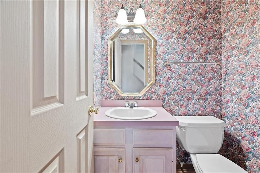 450 Vaneal Road Washington, PA 15301 - Photo 7 of 25 a bathroom with a toilet sink and mirror
