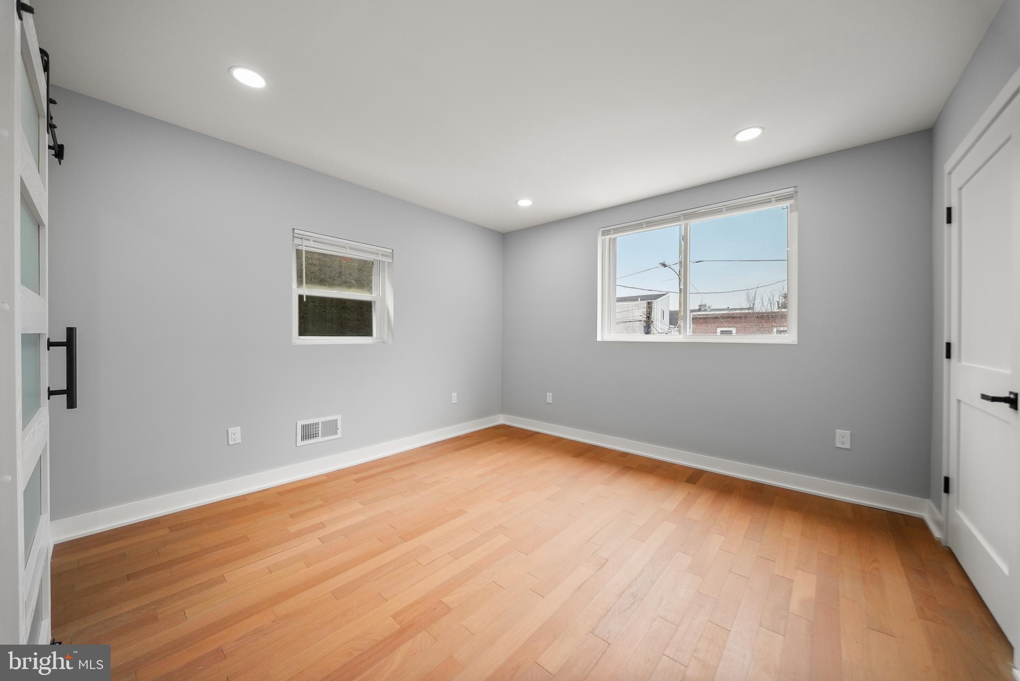 2811 Salmon Street Philadelphia, PA 19134 - Photo 11 of 25 a view of an empty room with a window
