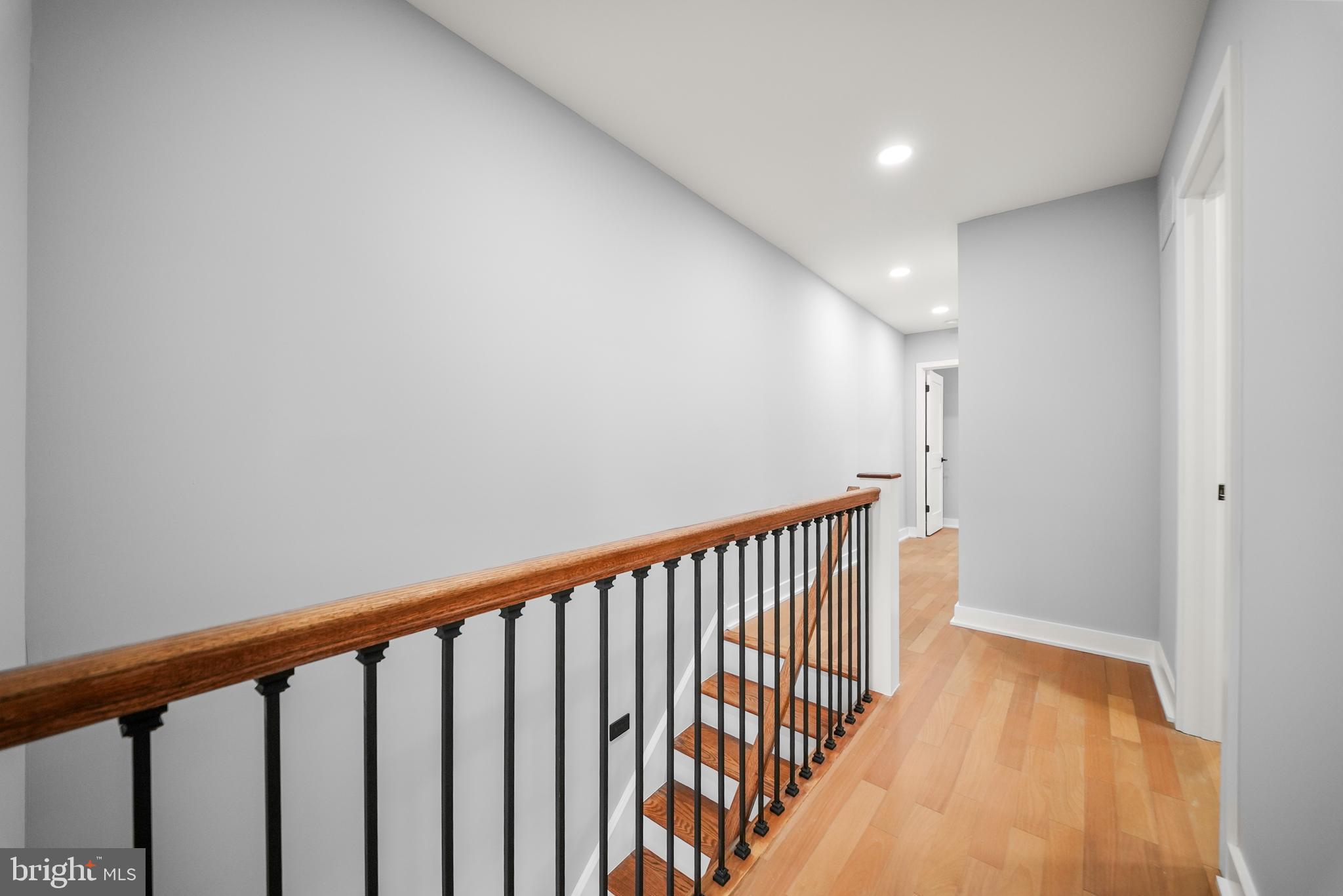 2811 Salmon Street Philadelphia, PA 19134 - Photo 15 of 25 a view of a hallway with wooden floor