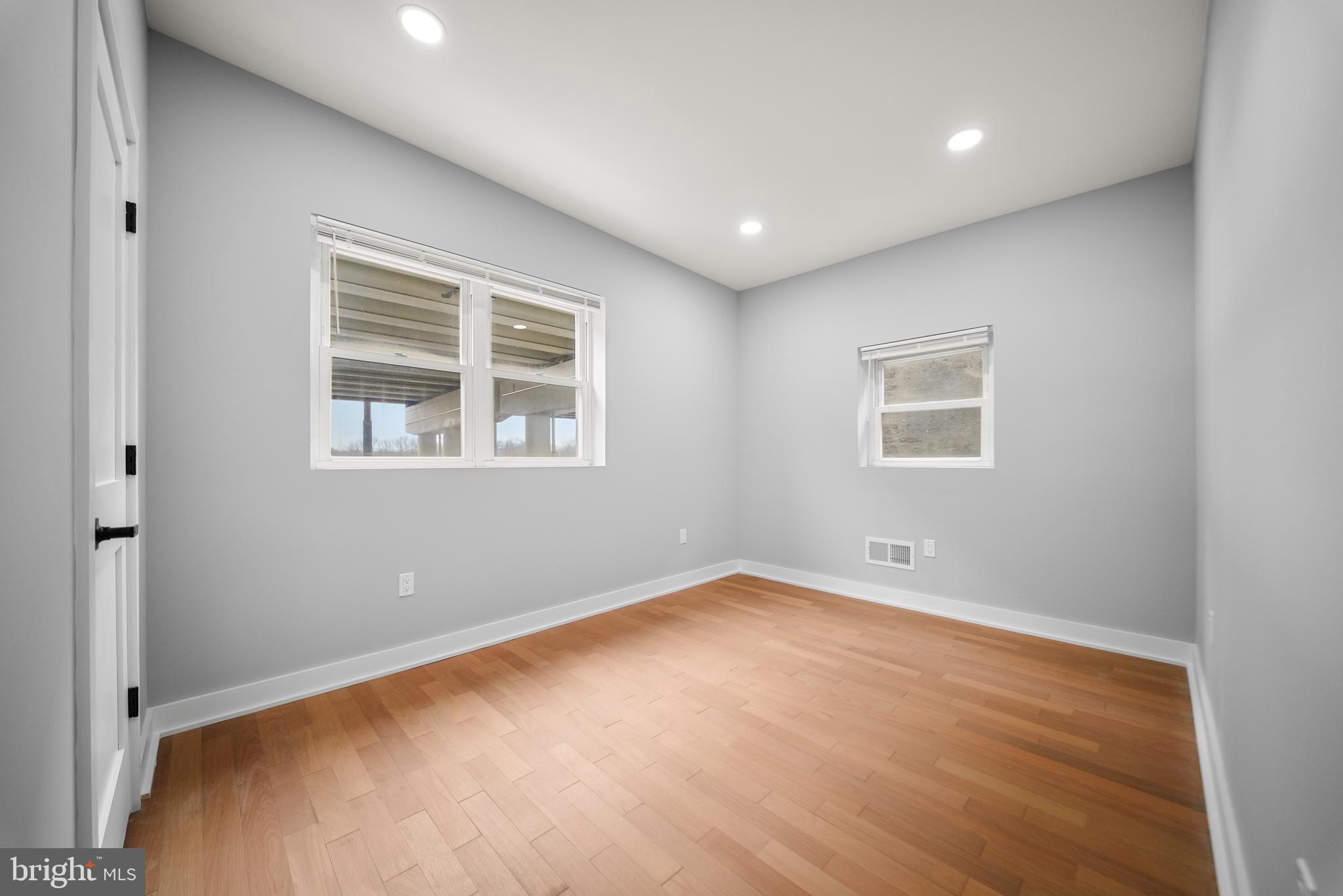 2811 Salmon Street Philadelphia, PA 19134 - Photo 21 of 25 a view of an empty room with a window