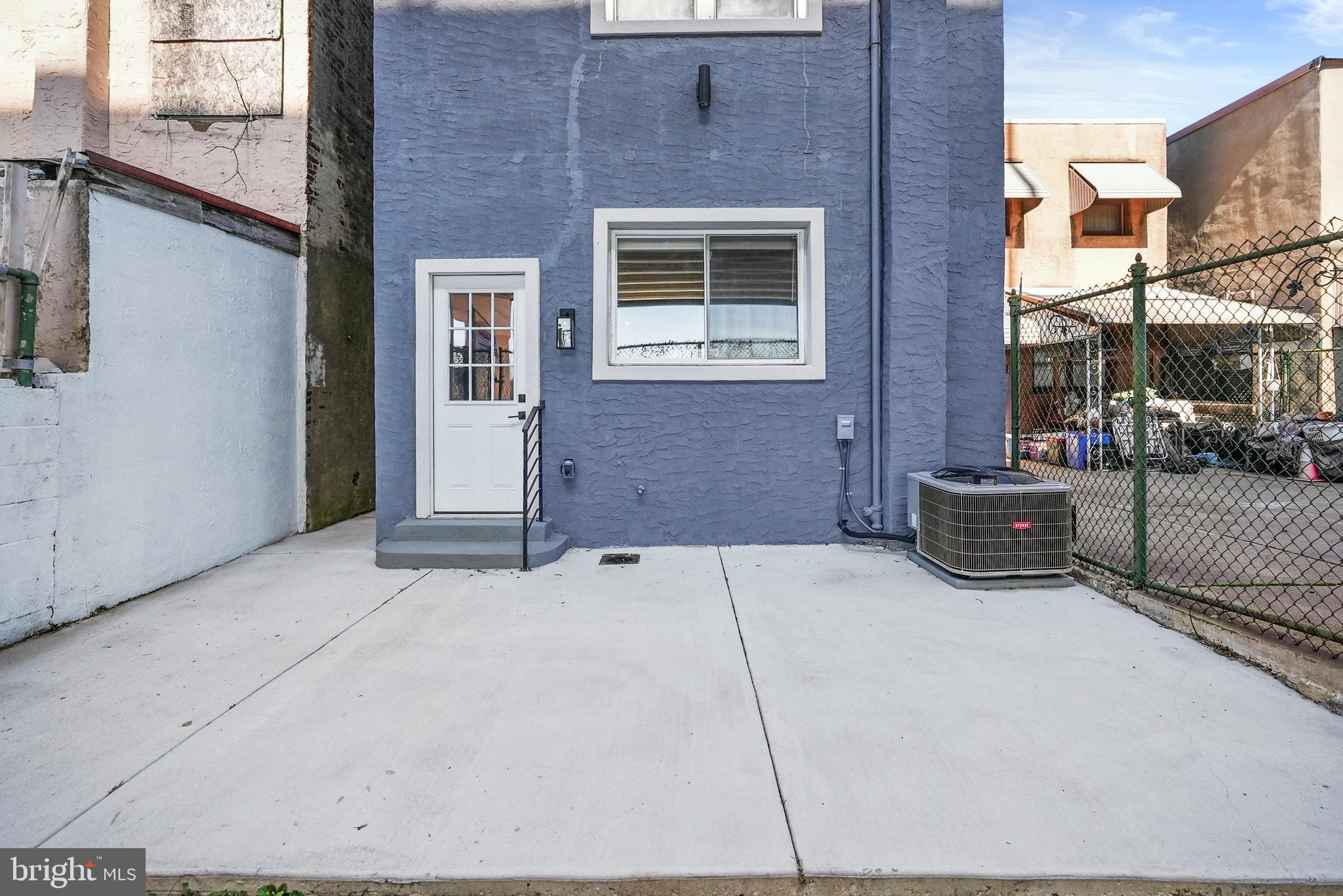 2811 Salmon Street Philadelphia, PA 19134 - Photo 25 of 25 a view of a house with couches and table