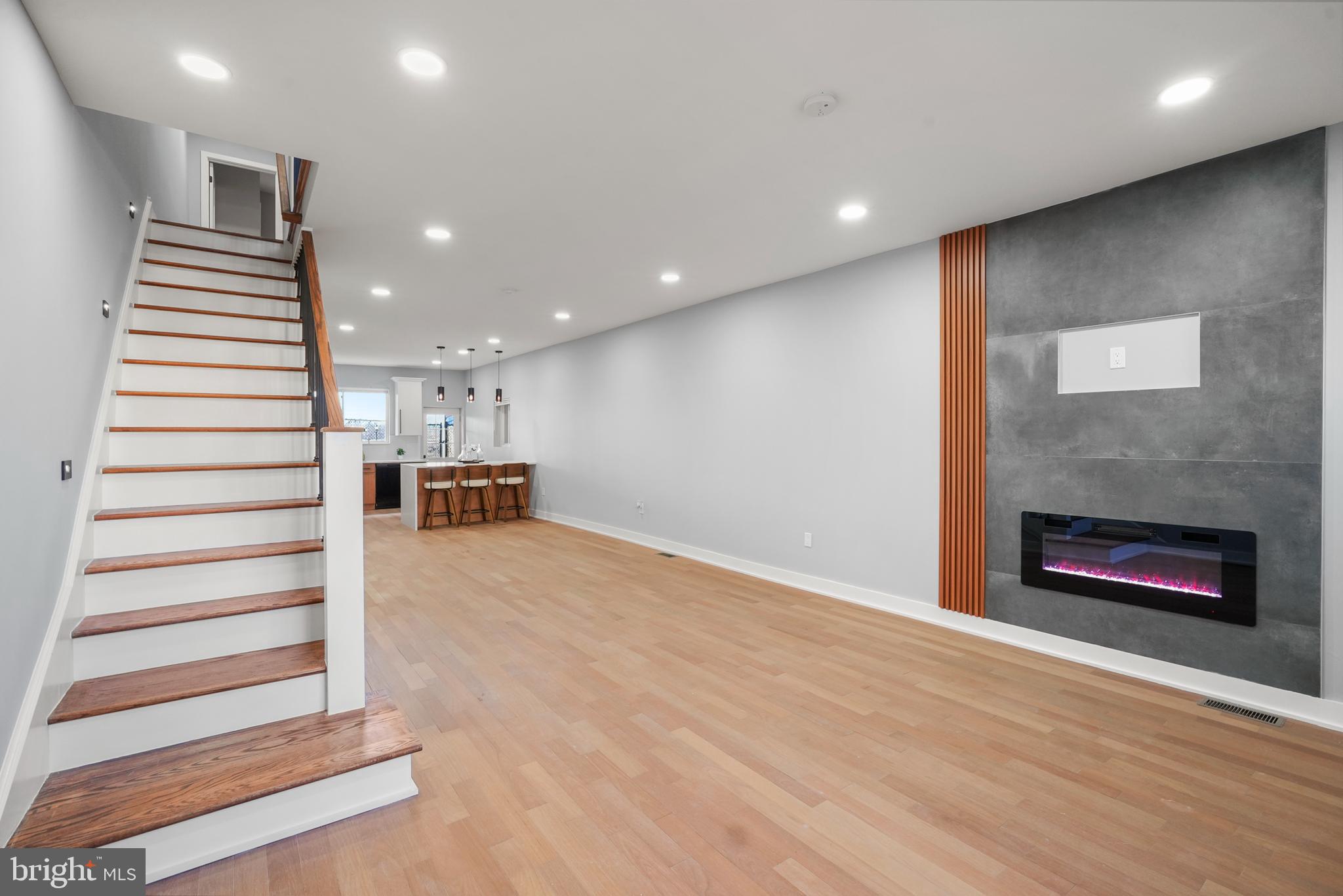 2811 Salmon Street Philadelphia, PA 19134 - Photo 9 of 25 a view of kitchen with furniture and a fireplace