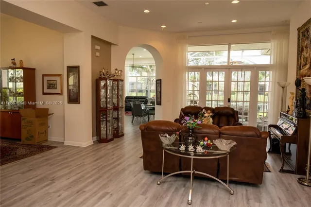 a view of a dining room with furniture window and outside view