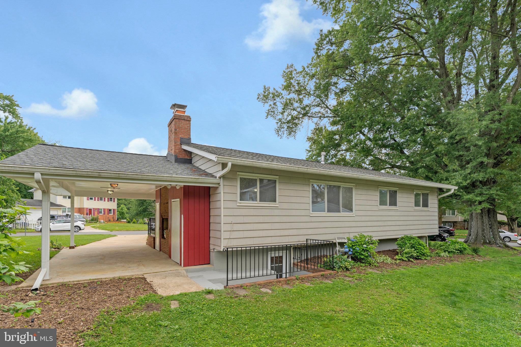 8230 Citadel Place Vienna, VA 22180 - Photo 33 of 38 a front view of a house with garden