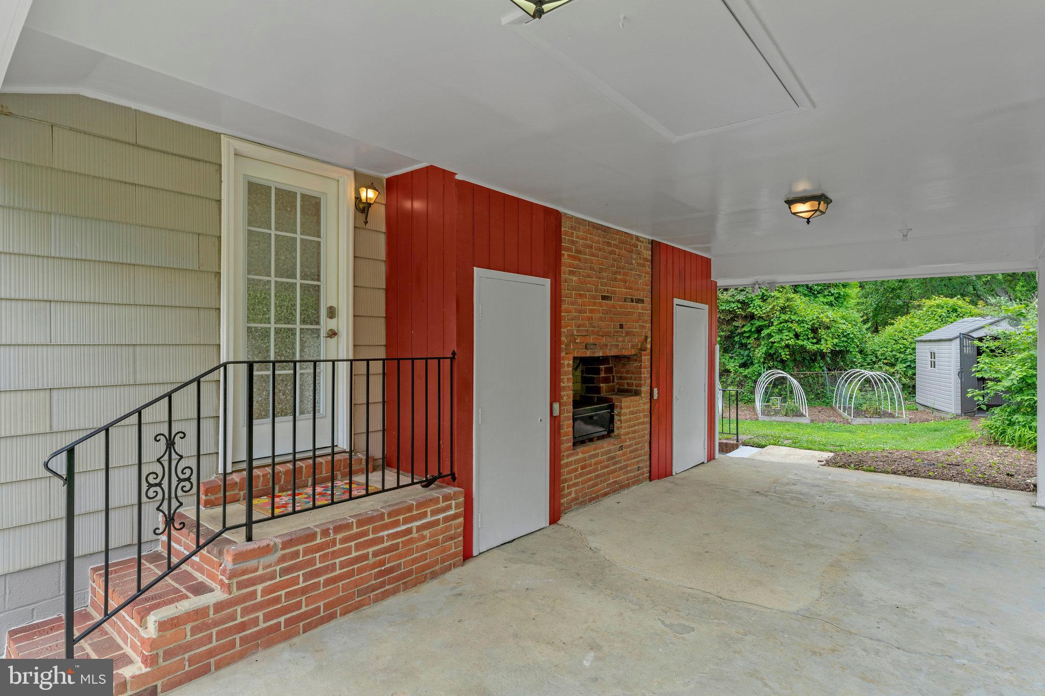 8230 Citadel Place Vienna, VA 22180 - Photo 35 of 38 a view of a house with porch and wooden floor